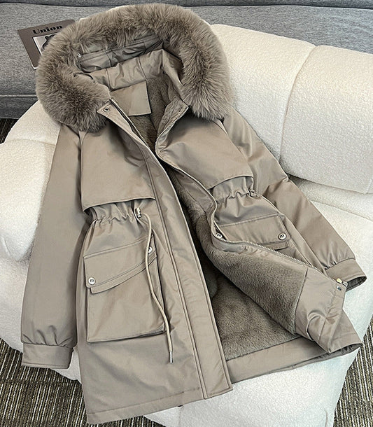 Black water repellent winter parka with an adjustable faux fur trimmed hood and large side pockets