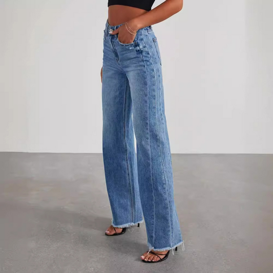 Blue wide leg high waisted jeans with a long flowing leg and classic denim finish